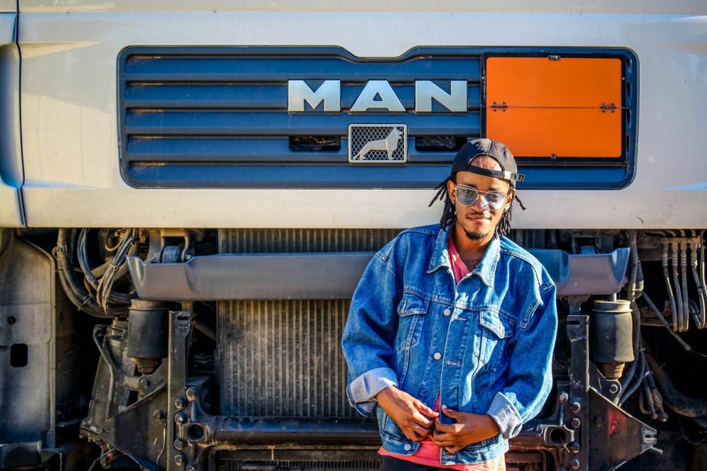 Man in Front of Truck