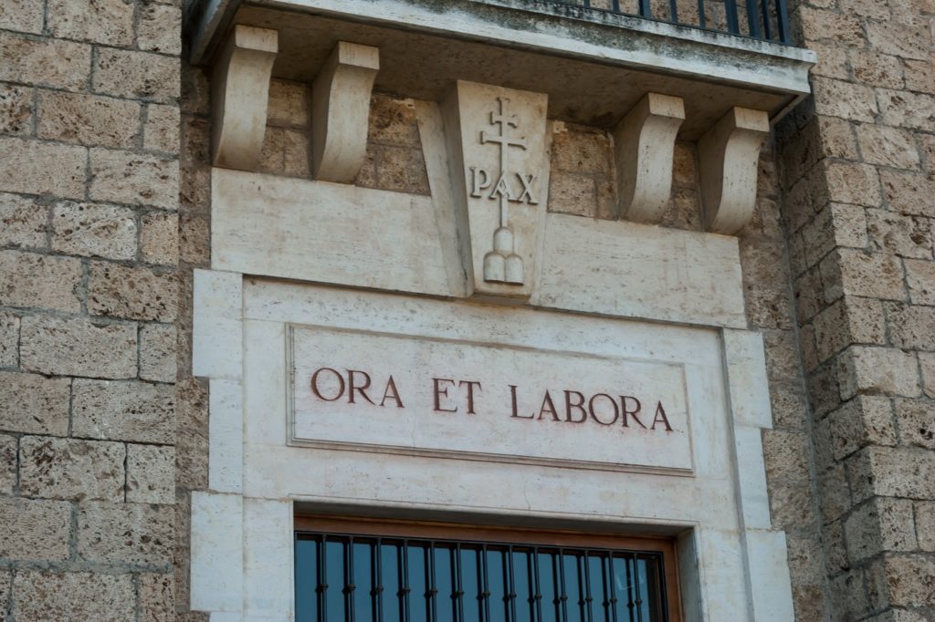 Ora et Labora written over door