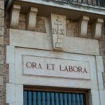 Ora et Labora written over door