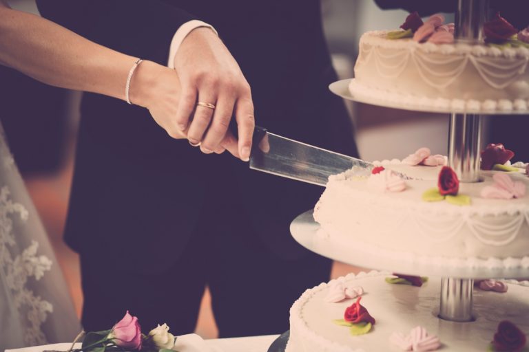 Bride & Groom cutting wedding cake