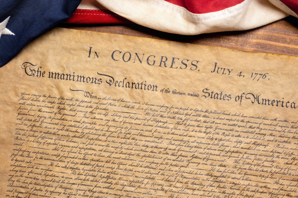 Declaration of Independence with an American flag