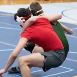 Two men wrestling