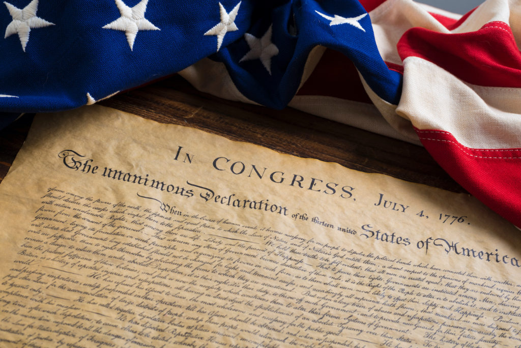 Photo of Declaration of Independence with flag
