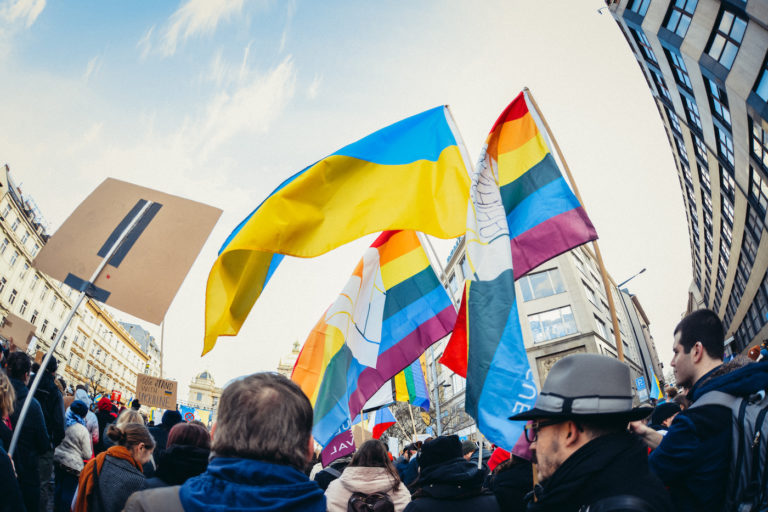 Protest with Ukraine flag and Rainbow flags