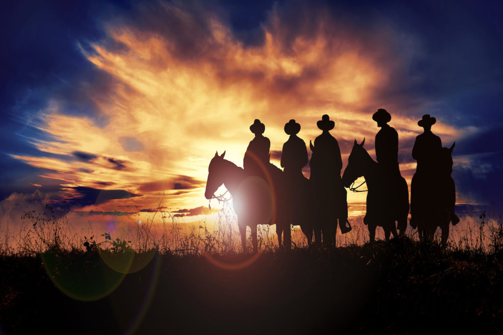 cowboys, sunset