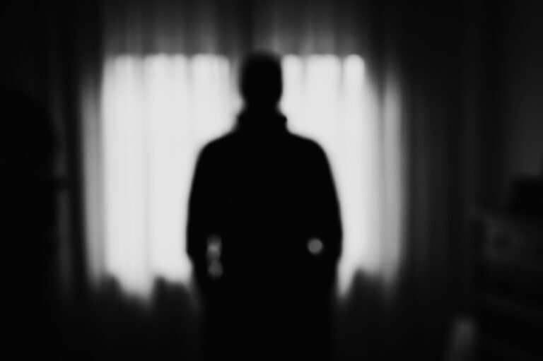 Blurry shadow in front of the window - Concept of mystery and inner disorder