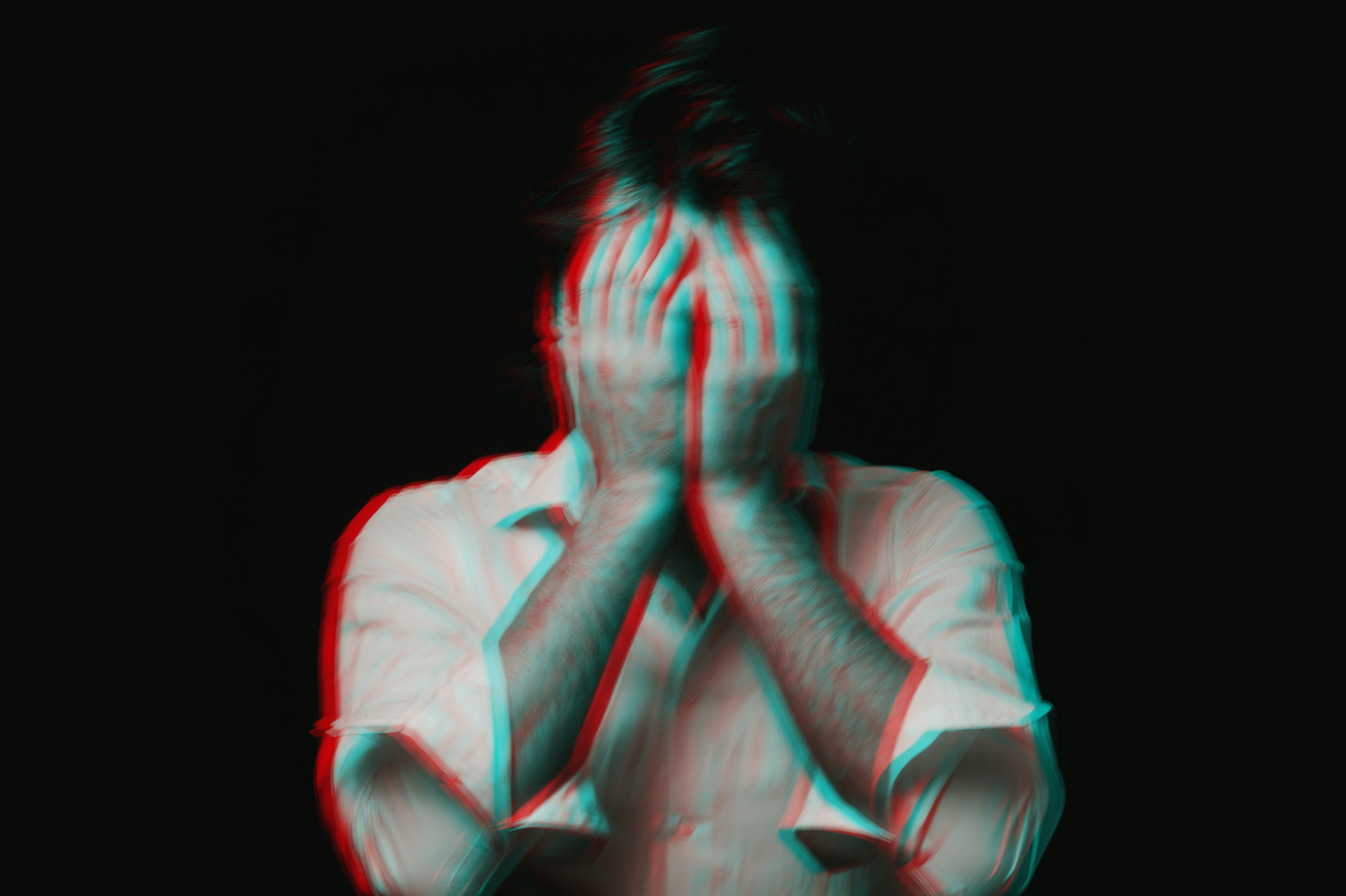 Abstract blurry portrait of a depressed man with mental personality disorders