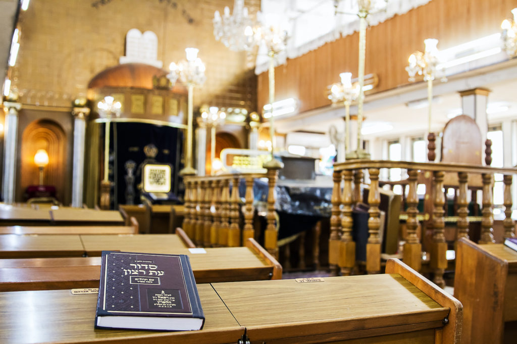 Bnei Brak , Israel - October 18 . 2018: The interior of the synagogue Brahat ha-levana in Bnei Brak . Israel . Designated congregation and the altar.