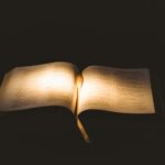 Light shining on open bible