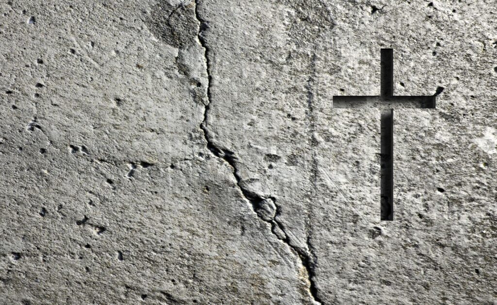 old cracked wall and cross