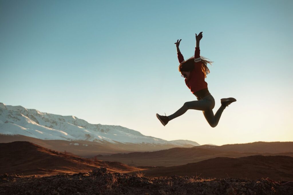 healthy happy person jumping
